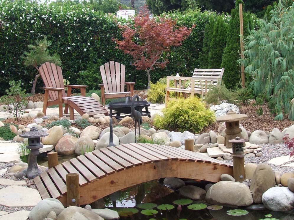 Arching Bridge Over Pond